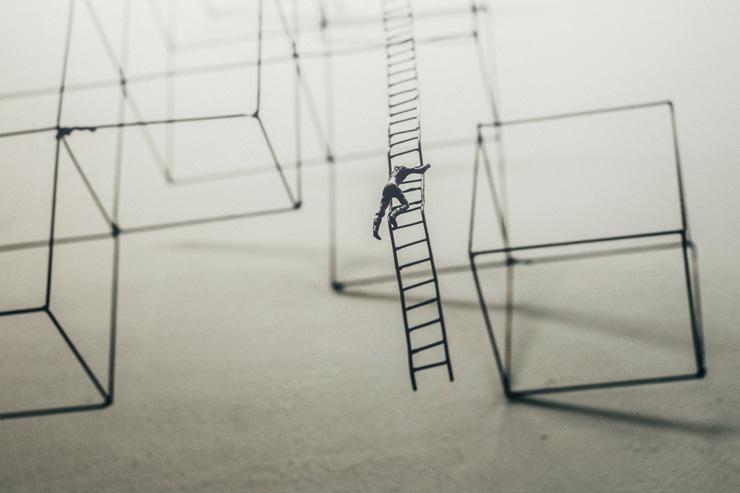 How to Thrive in Times of Change, by Gary Douglas. Illustration of man climbing latter by Jason Wong