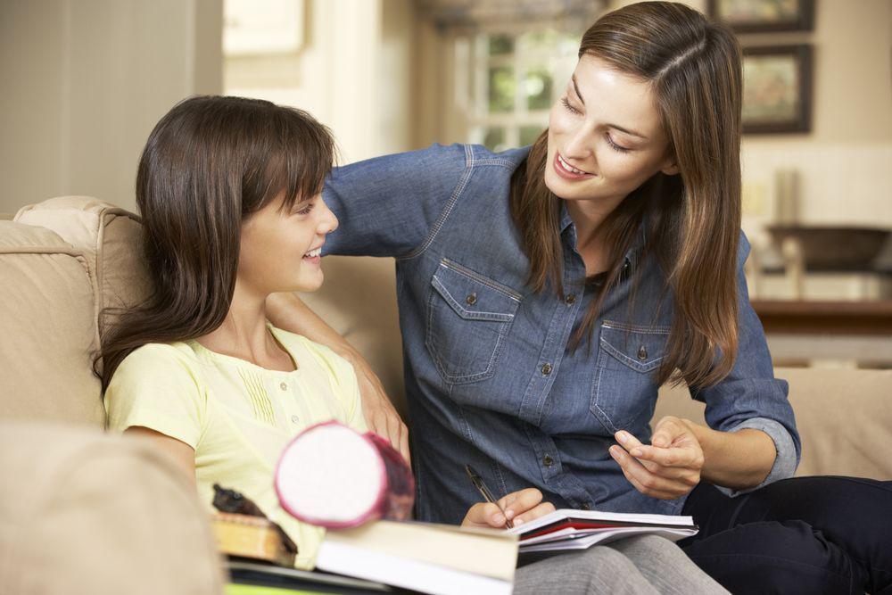 Mom Helping Daughter with Homework 