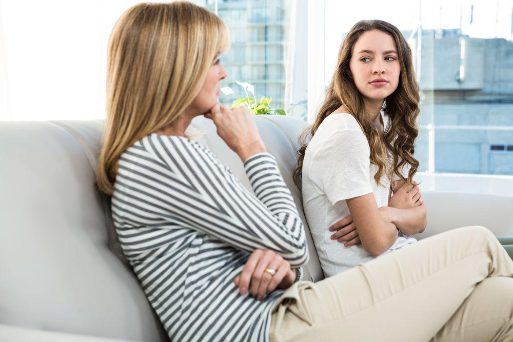 Mom talking to daughter