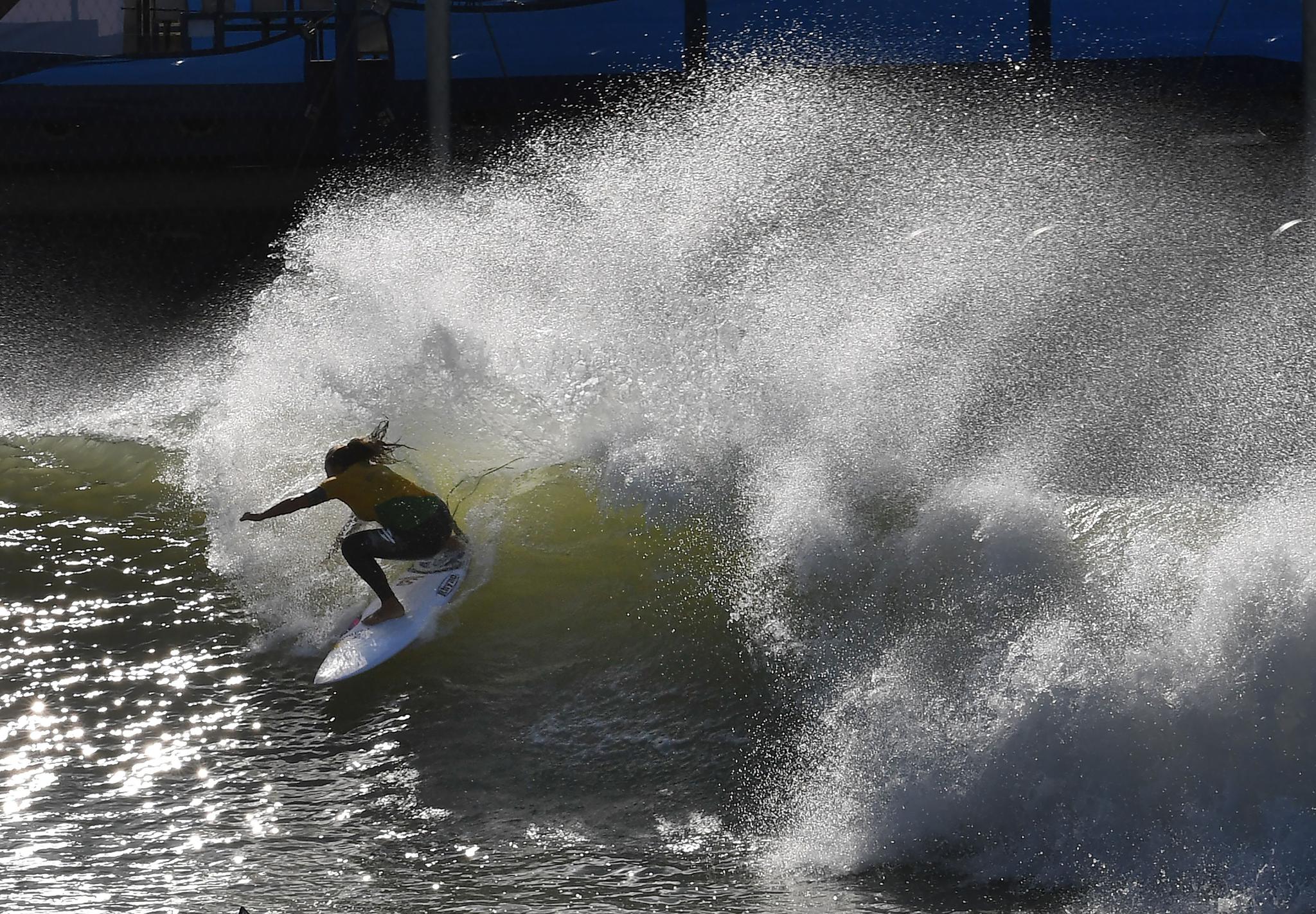 Silvana Lima of Brazil rides a wave during practice before the WSL Founders' Cup of Surfing. Surface tension, which lets waves hold their shape, is one of water's many anomalies.