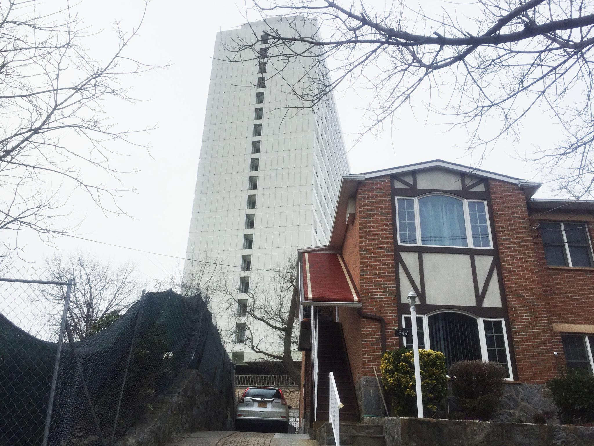 The residency for the Russian Federation's Permanent Mission to the United Nations has towered over single-family homes like this one in the Bronx, New York since 1974, pictured here Feb. 27, 2017. CIA and FBI officials believe the compound is also used to conduct Moscow's foreign intelligence services.