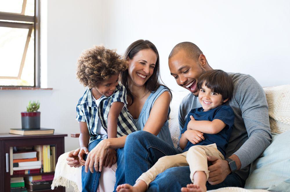 mom and dad with two kids