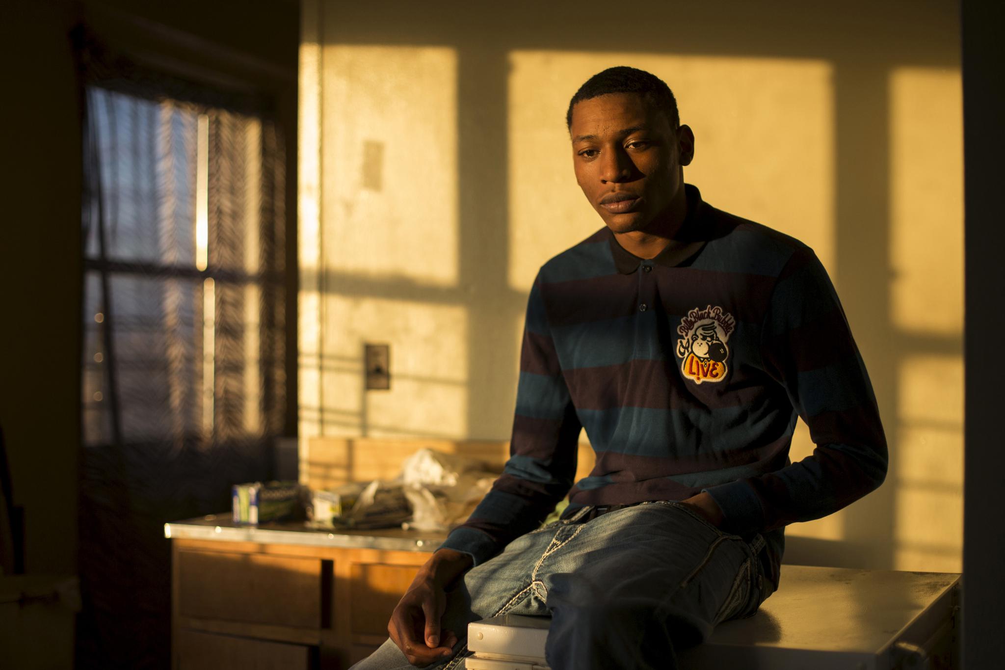 Damien Norman was 17 when he says a Rikers Island guard broke his wrist and sent him to solitary while he was awaiting trial. The jail, experts say, continues to "accelerate misery."