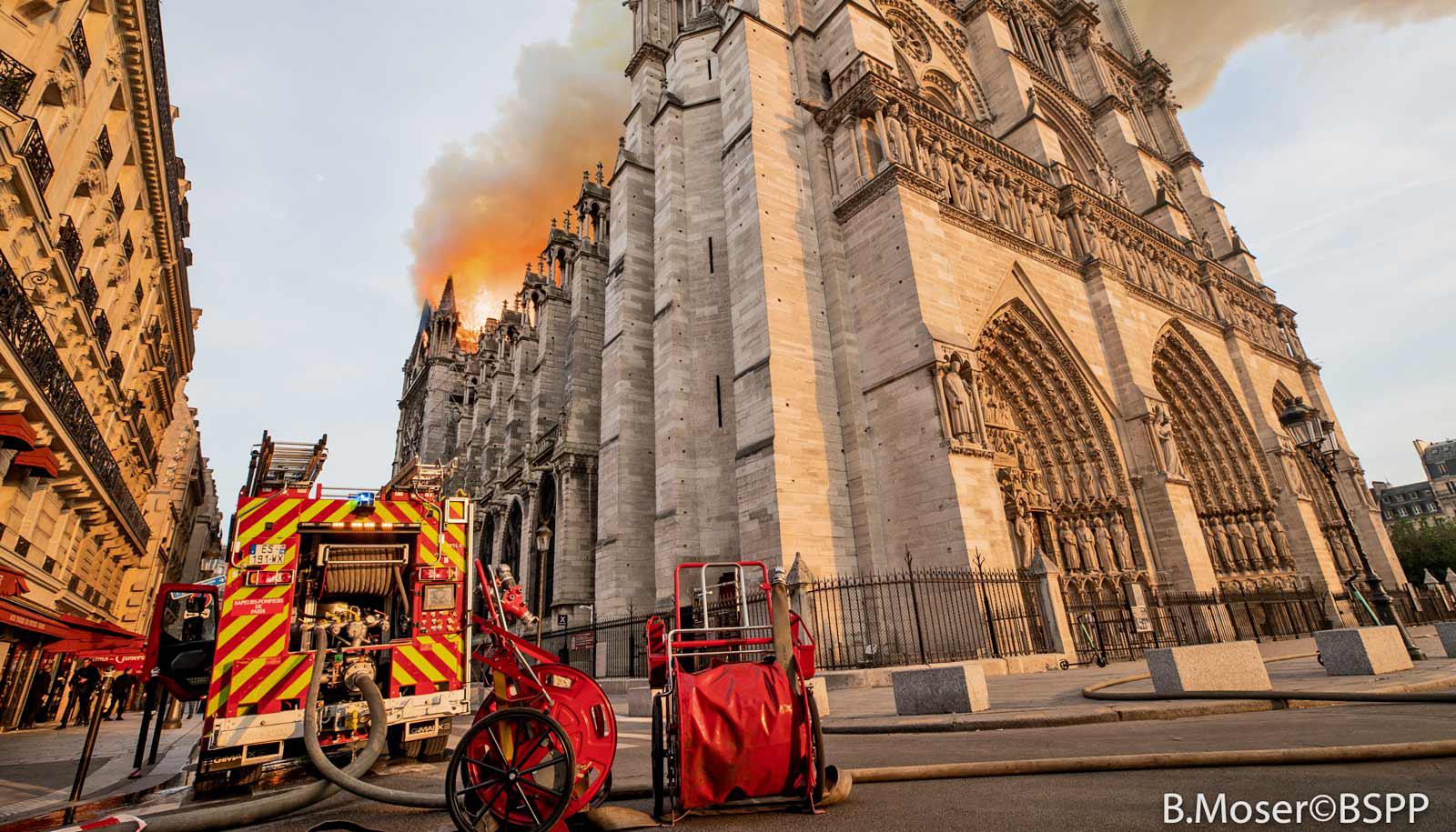 fire truck near Notre Dame as it burns