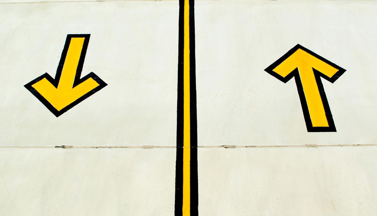 up arrow and down arrow with line in between