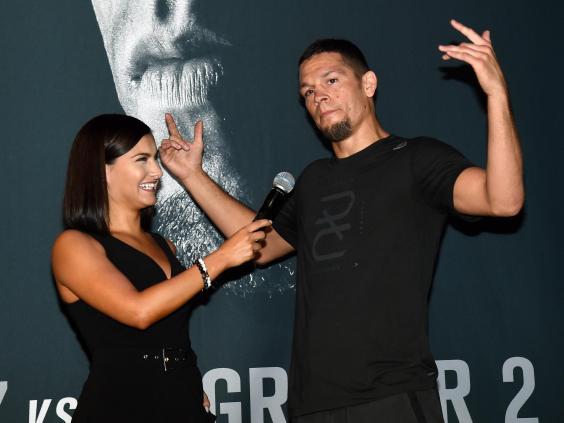 Megan Olivi interviewing UFC fighter Nate Diaz (Getty Images)