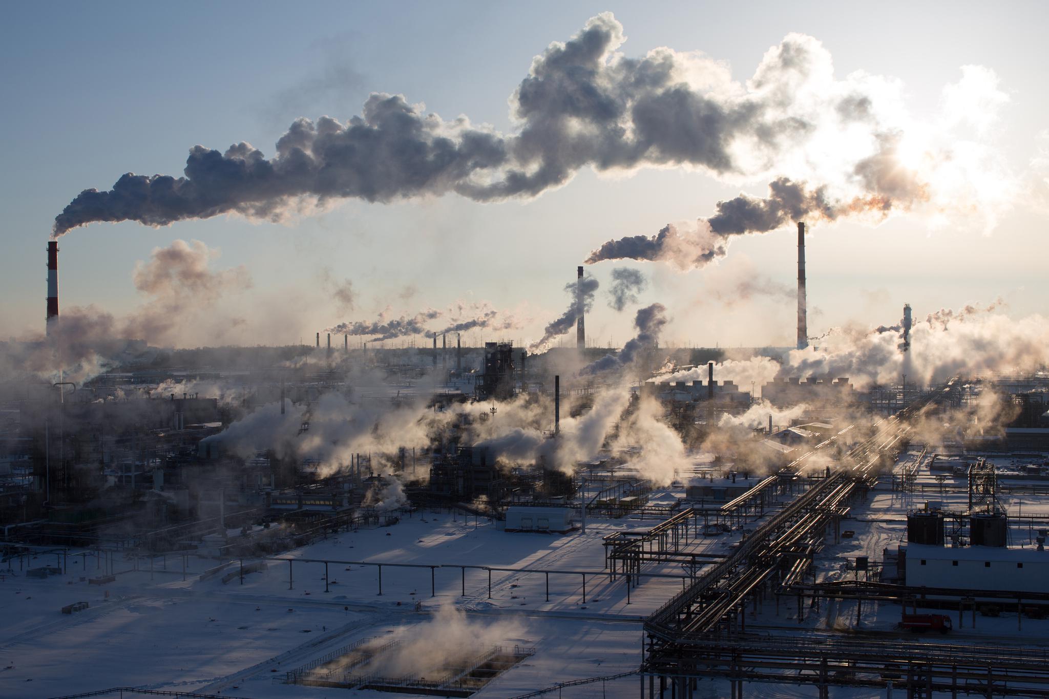 Chimneys emit vapor at Russia's Novokuybyshevsk oil refinery plant.