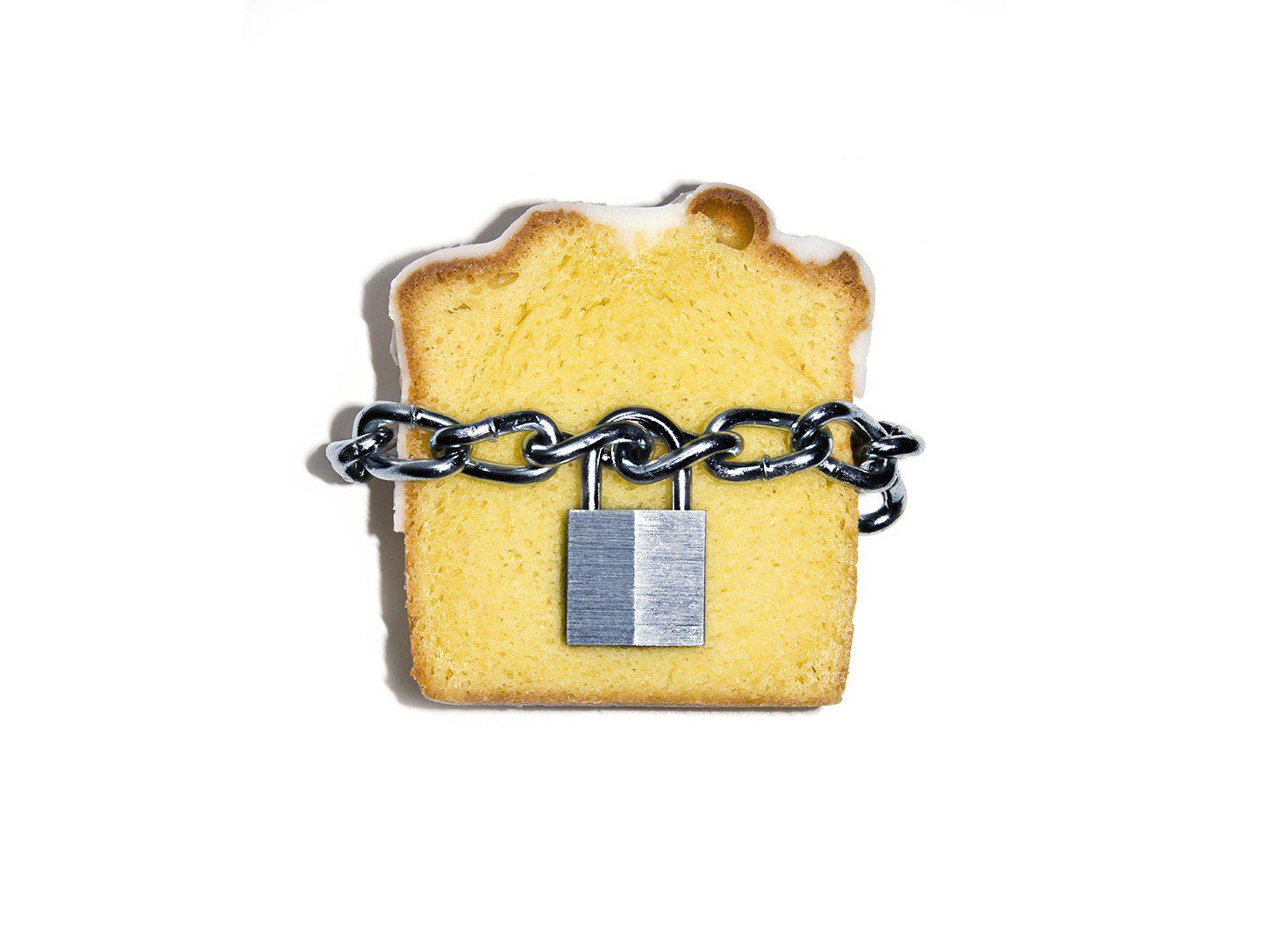 Slice of pound cake with lock and chain