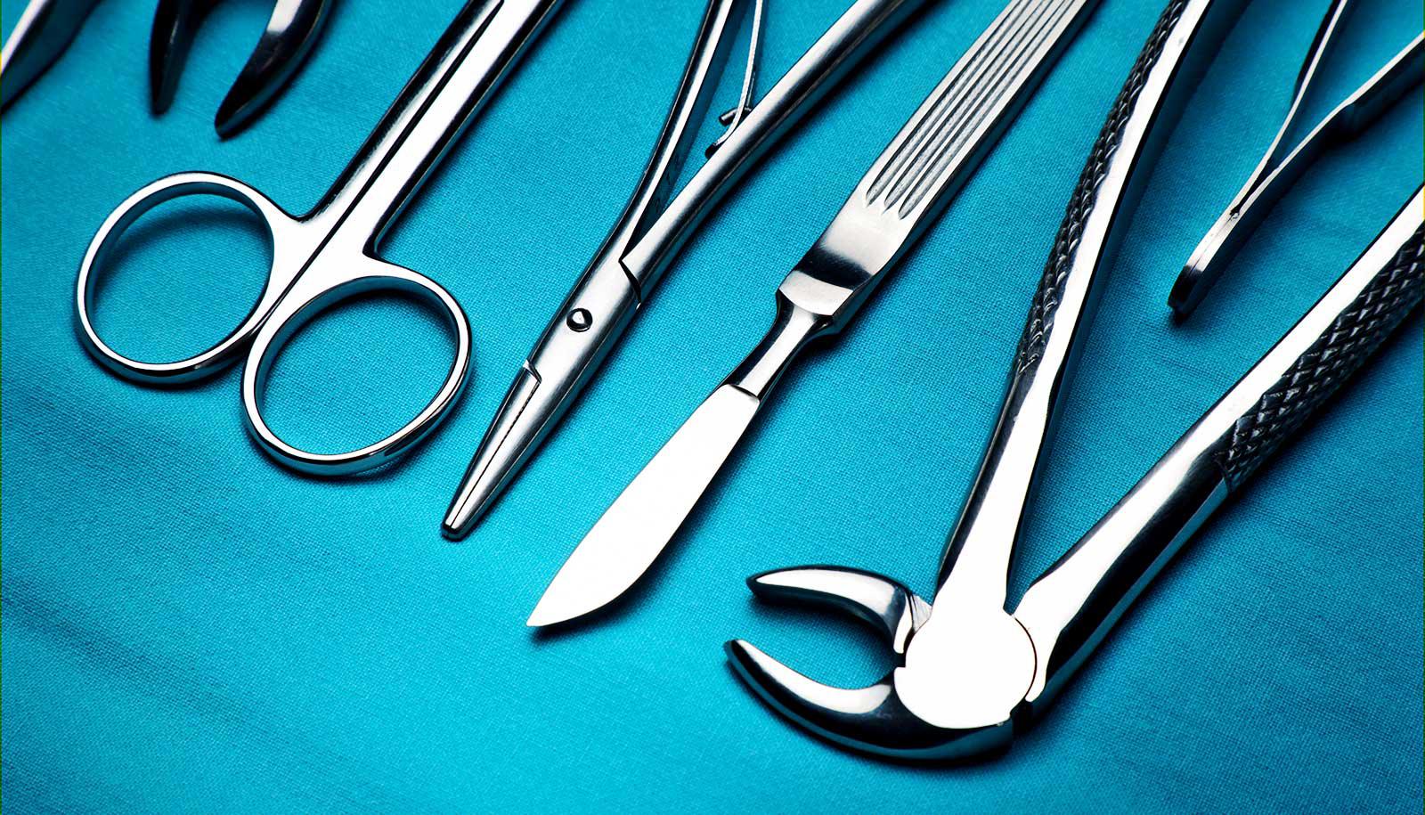 Surgical implements on a blue cloth