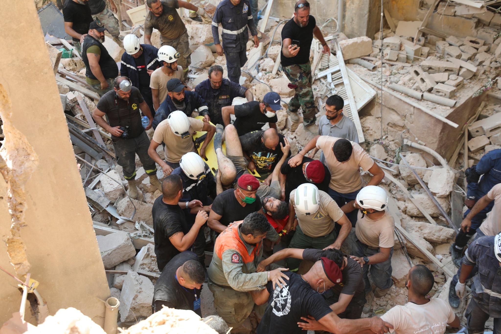 A survivor is taken out of the rubble after a massive explosion in Beirut, Lebanon (AP)