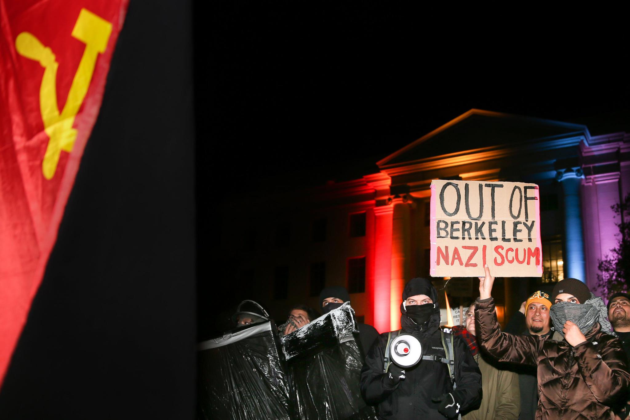 People protest controversial Breitbart writer Milo Yiannopoulos at UC Berkeley on February 1. A scheduled speech by Yiannopoulos was canceled after the protests became violent.