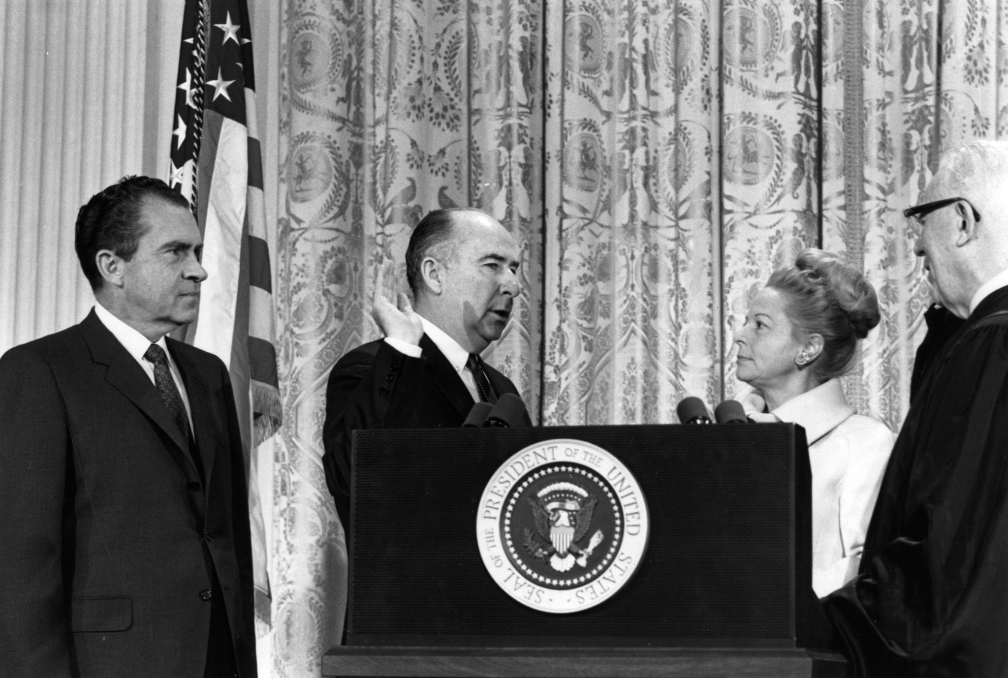 Martha Mitchell with her husband, former Attorney General John Mitchell, one of Richard Nixon's top aides, when he was being sworn in at the Senate on May 11, 1973.