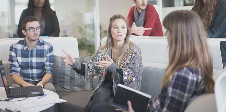 What It Means to Be A Leader in the Digital Age by Alexie Carter. Photograph of a business meeting from Pixabay