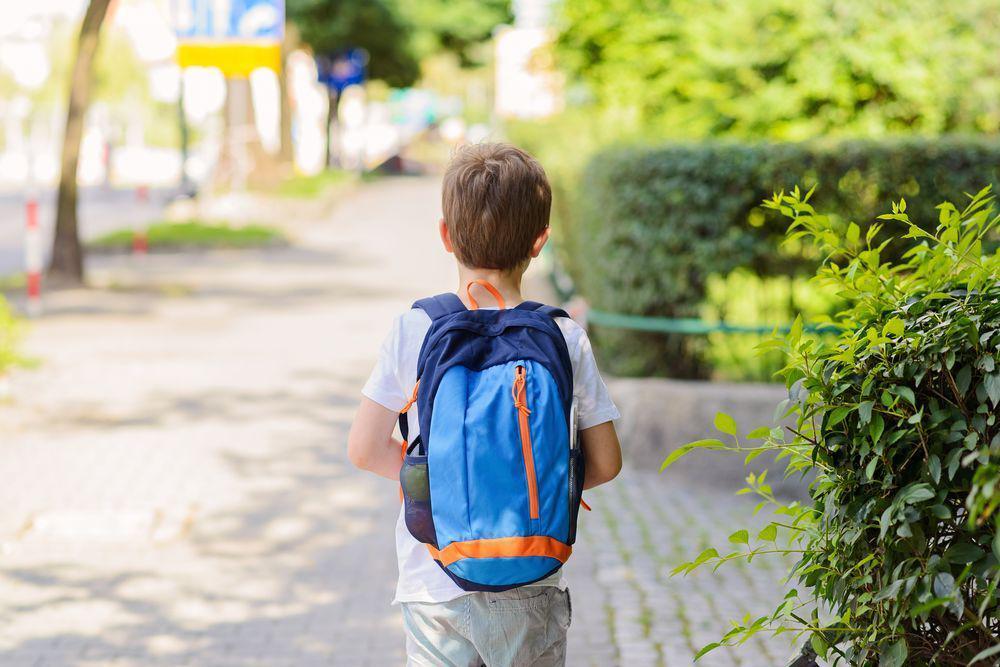 kid walking to school