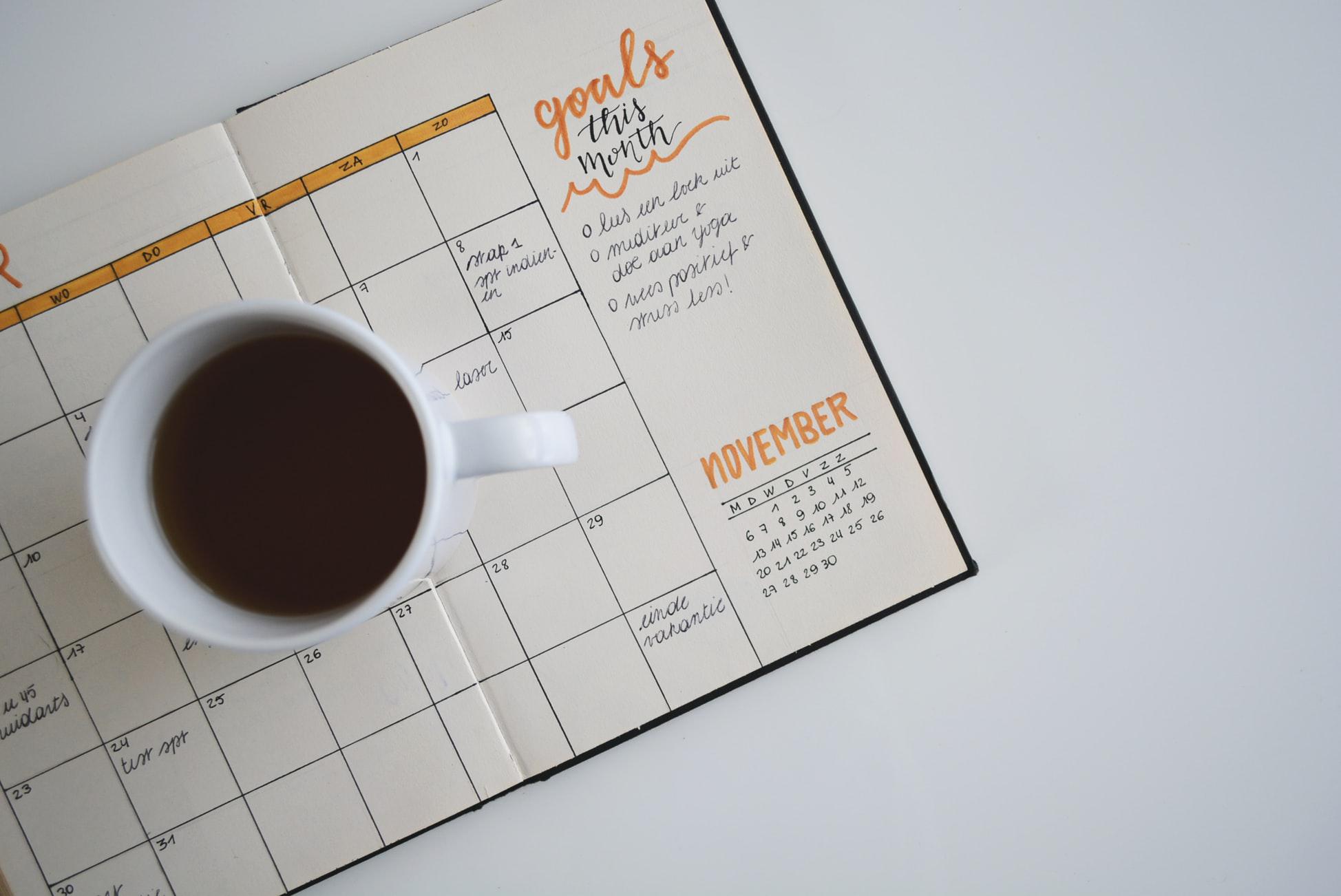4 Keys to Creating A Lasting, Healthy Lifestyle Change by Ashley Walter. Photograph of a planner with goals written out by Estee Janssens