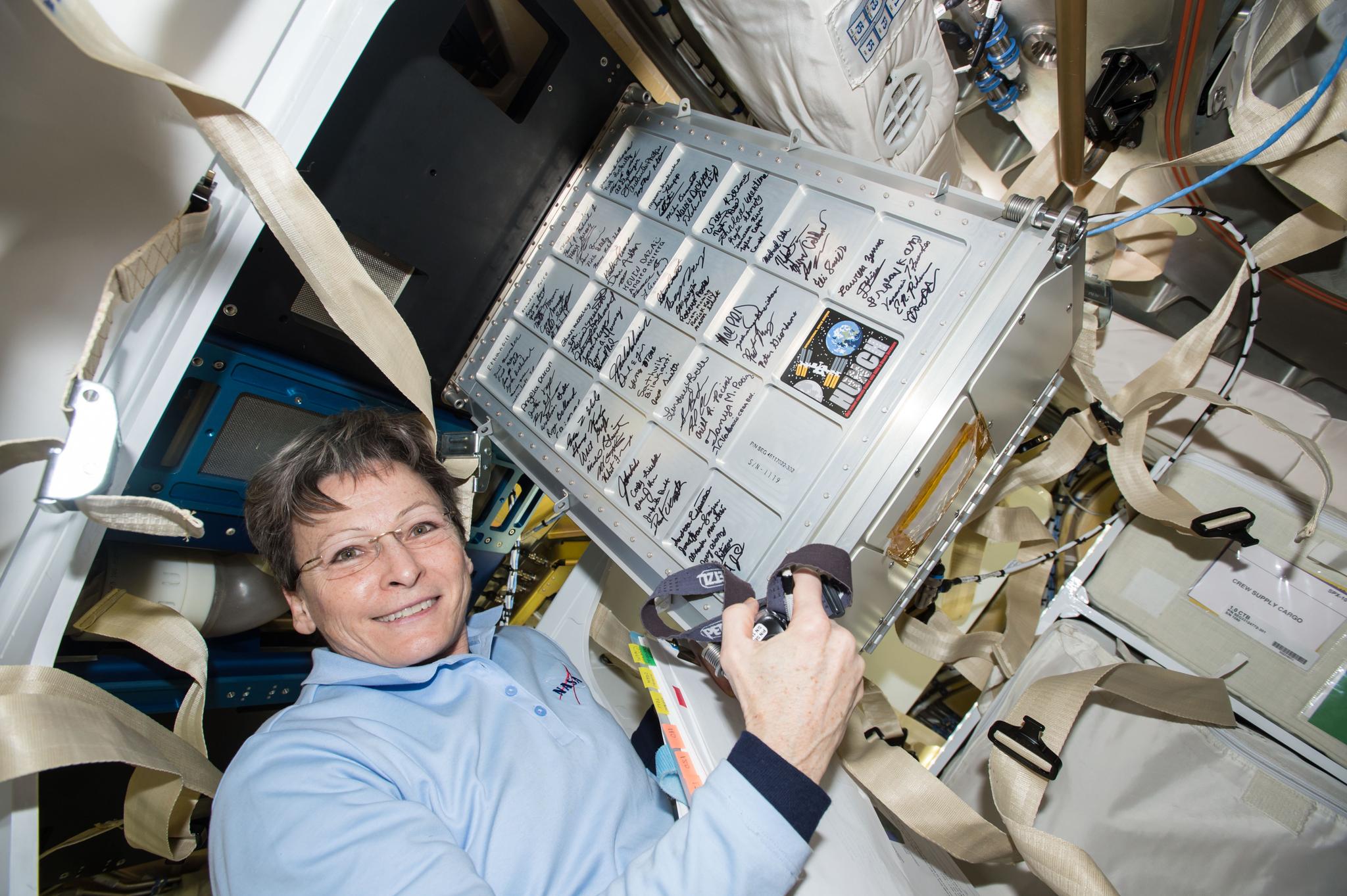 NASA astronaut Peggy Whitson unloads a storage locker that was built as part of the NASA High School Students United with NASA to Create Hardware (HUNCH) program, on the International Space Station on March 9. Students in the HUNCH program receive valuable experience creating goods for NASA, from hardware to meals for astronauts, while NASA receives the creativity of the high school students.