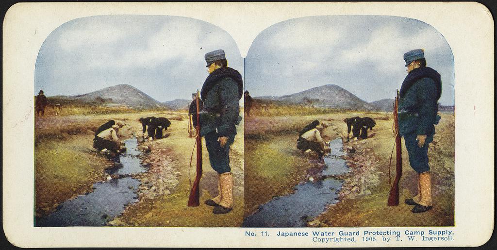 Japanese water guard protecting the camp's supply from contamination