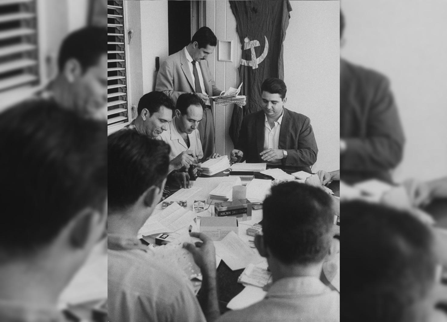 Antonio Veciana stands in a meeting with members of the anti-Castro action group Alpha 66, on October 1, 1962.