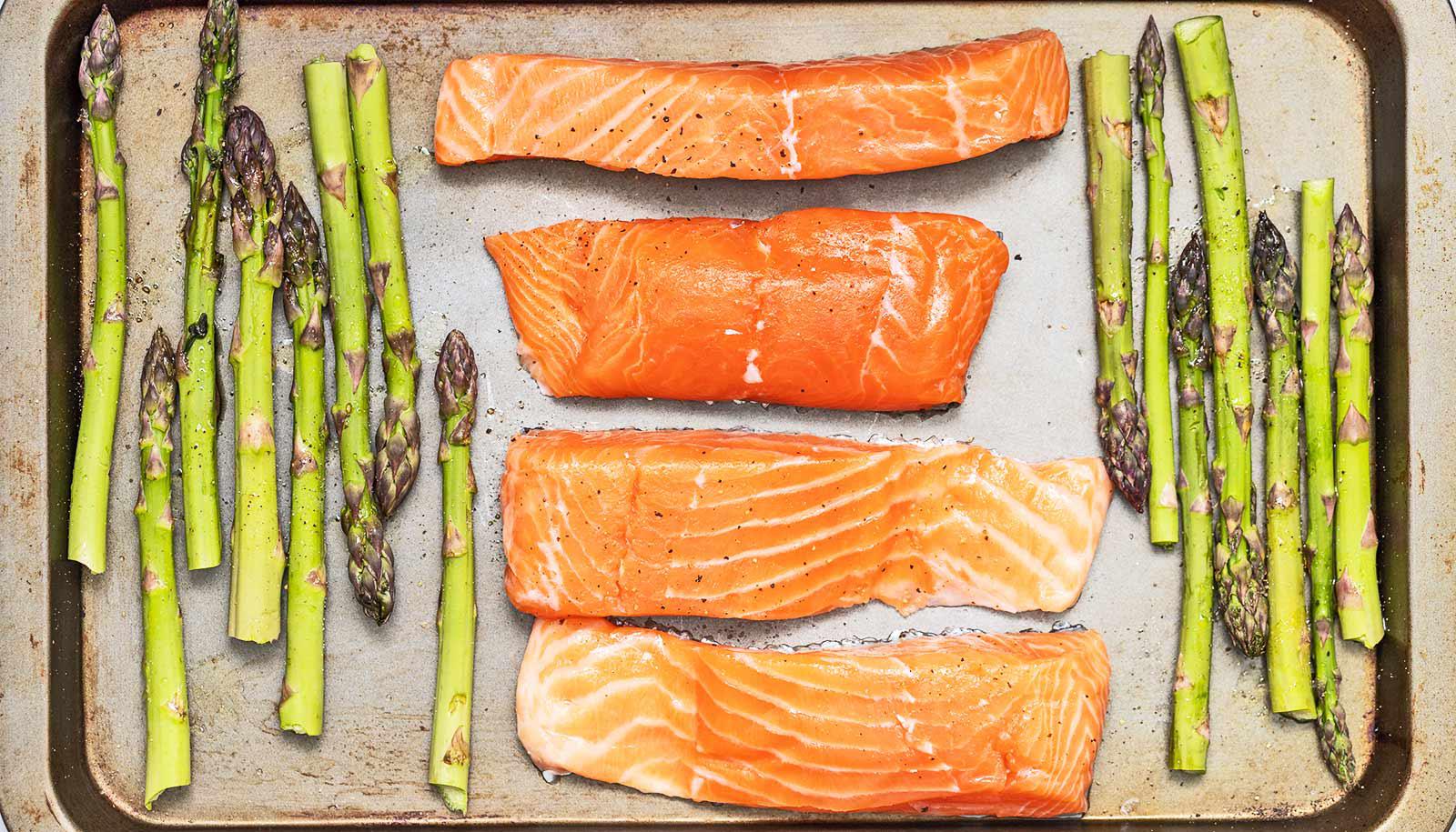 salmon pieces and asparagus on sheet pan