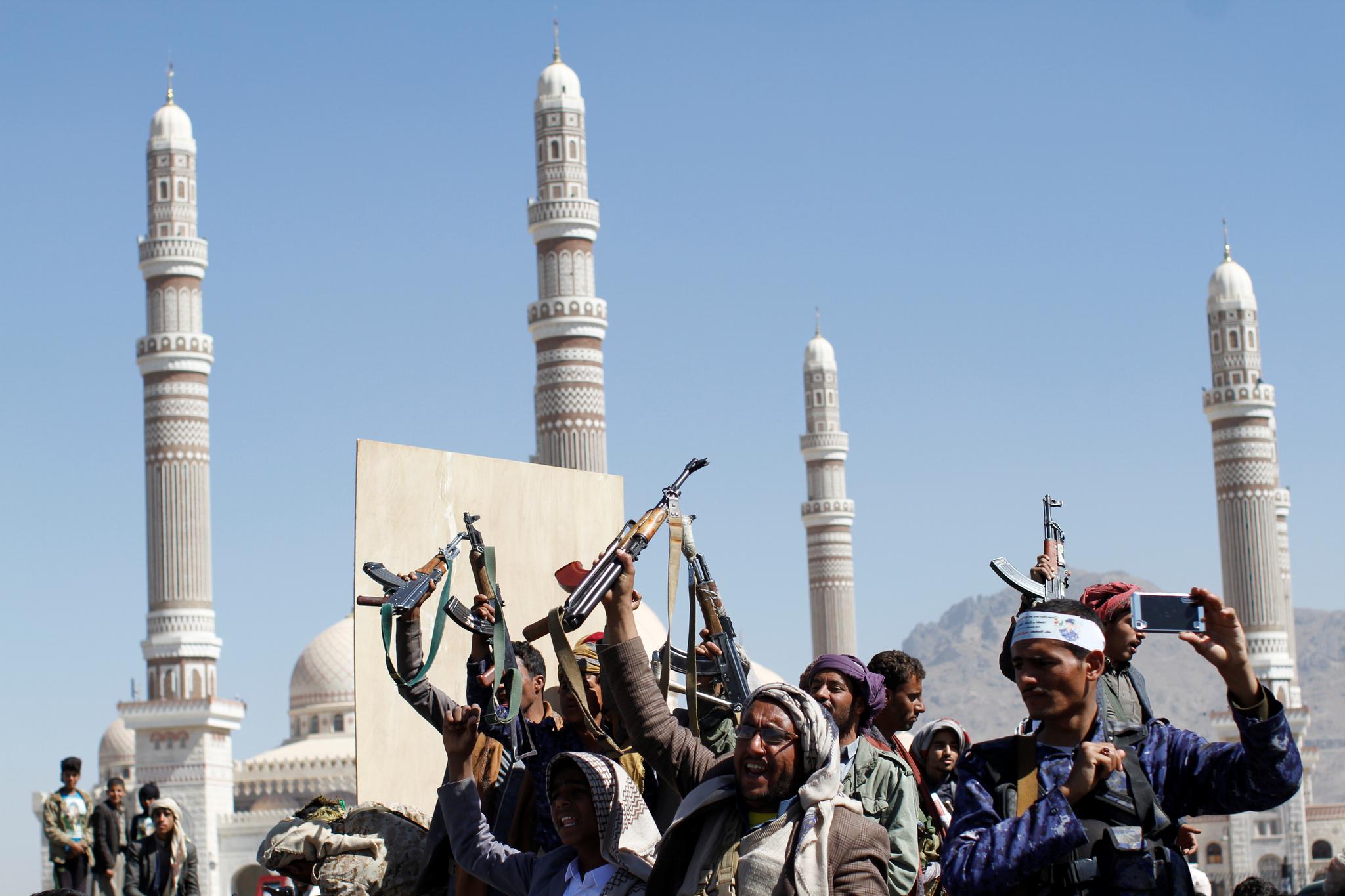 Houthi fighters attend the funeral of fellow combatants who were killed during the recent clashes in Sanaa, Yemen, December 7.