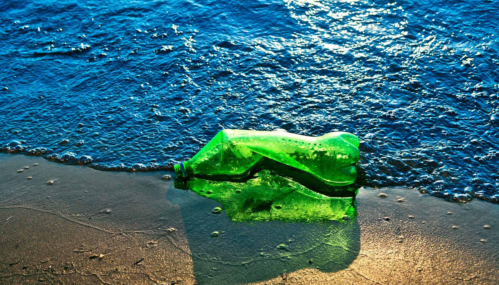 plastic bottle on the beach (plastic concept)