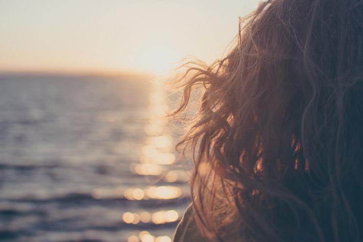 Are your principles serving you? By David James DiPardo. Photograph of person looking at sunset by Philipp Cordts