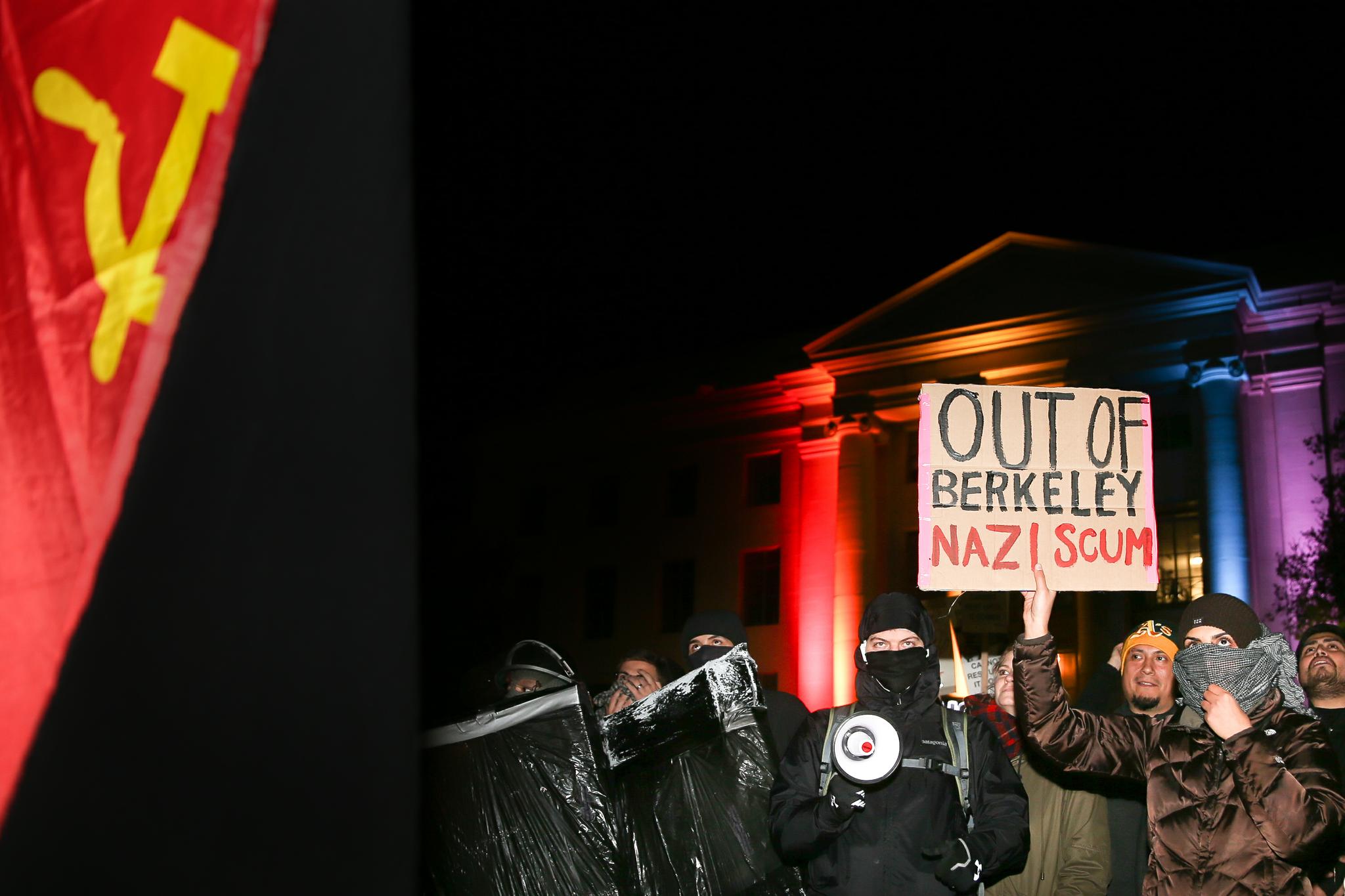 People protest controversial Breitbart writer Milo Yiannopoulos at UC Berkeley on February 1. A scheduled speech by Yiannopoulos was canceled after the protests became violent.