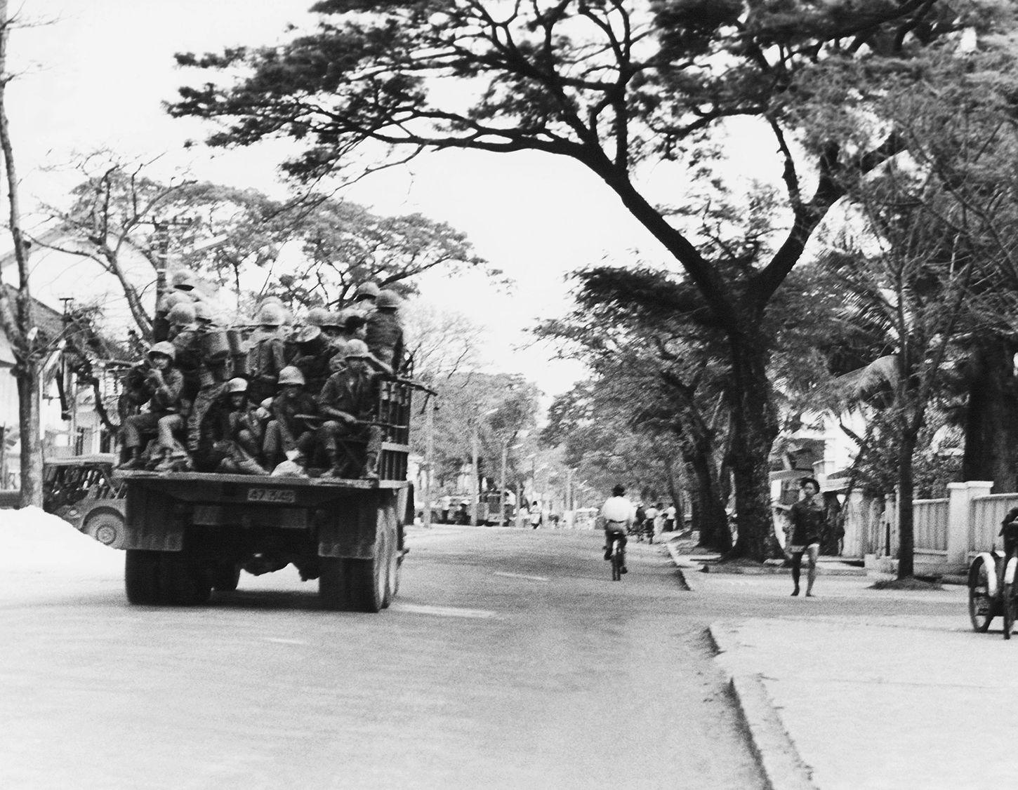 A truckload of Vietnamese soldiers loyal to then-Premier Ky moves through a Danang street, May 15, 1966. An airlift brought some 2,500 troops to take control of radio station, city hall and other strategic areas.