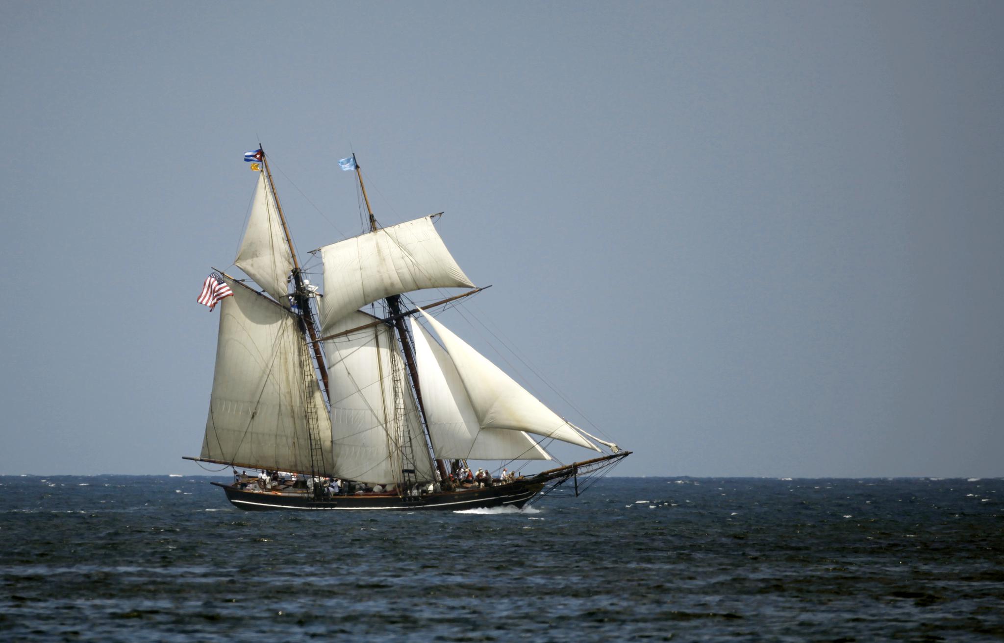 The Schooner, "Amistad", (Friendship) flies the U.S. flag and the Cuban flag as it approaches Havana Harbor March 25, 2010. The Schooner is a replica of the 19th century slave revolt Cuban slave ship that carried Africans and became an icon of the abolitionist movement.