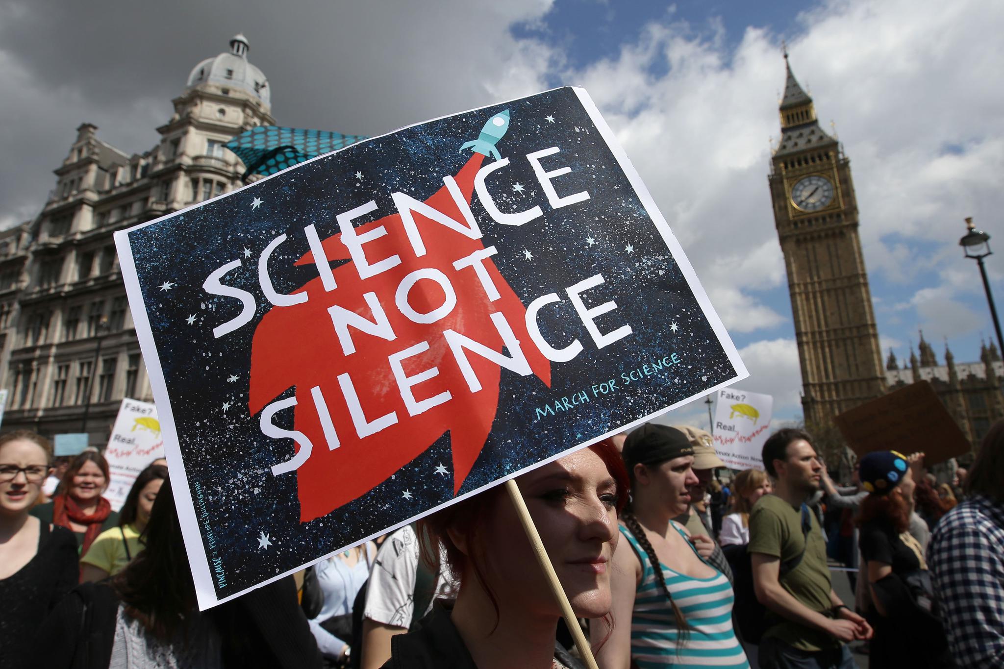 Scientists and science enthusiasts participate in the March for Science in London on April 22, 2017. Since last year's event, dozens of scientists have filed to run in federal, state and local elections in the United States.