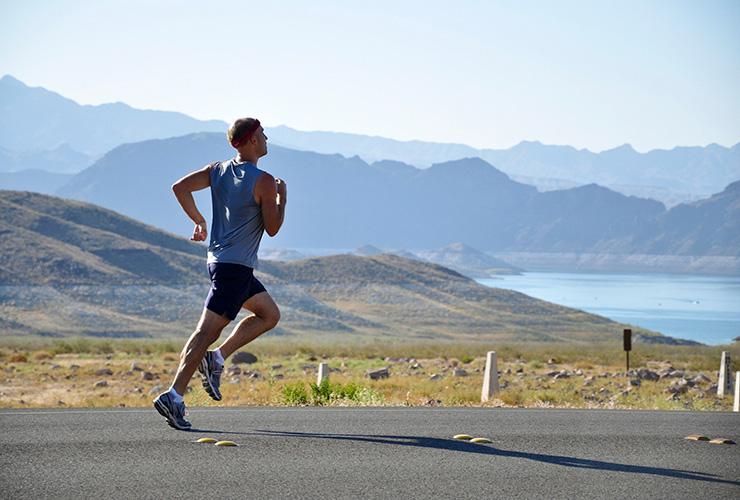 Movement for the Mind: How Running Reduces Depression & Anxiety Symptoms by Ian Lewis. Photograph of a man running in nature by Pixabay