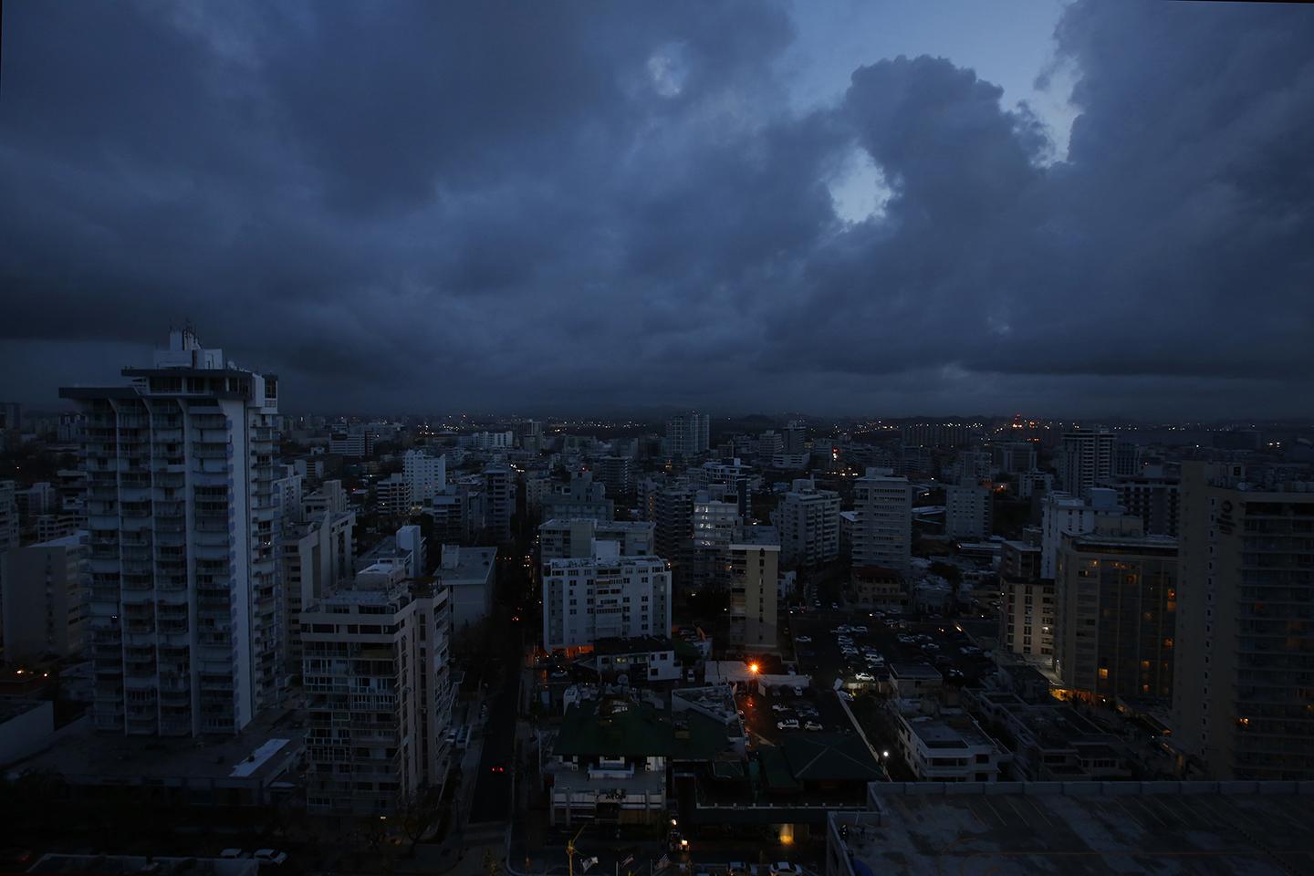 Downtown San Juan is cast in darkness on September 28, 2017. Any building with light was running off a generator, as there was no public electricity working on the whole island.