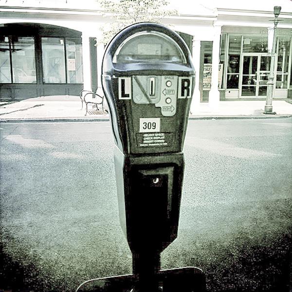 Be a Meter Feeder In Parking Lots (and Life): Finding Extraordinary in Ordinary, by Kristen Noel. Photograph of parking meter by Bill Miles