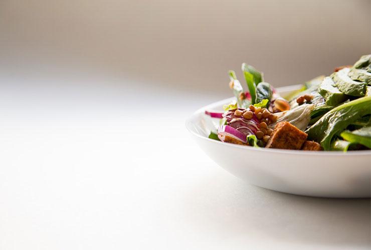 Health Benefits of a Macrobiotic Diet by Kennith Fletcher. Photograph of a vegetable dinner bowl by Hermes Rivera