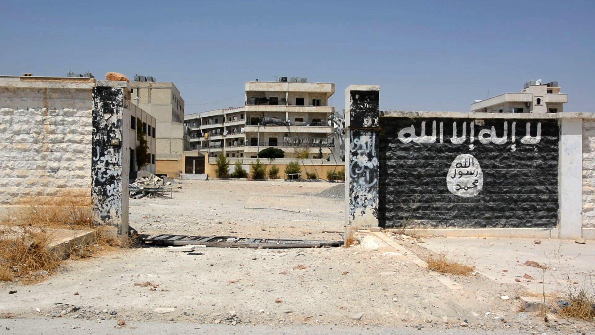 An image grab taken from an AFP video dated August 12 shows a school that was used by ISIS fighters to manufacture explosives in the northern Syrian town of Manbij, almost a week after the Syrian Democratic Forces (SDF), a coalition of Arab and Kurd fighters, seized the group's stronghold.