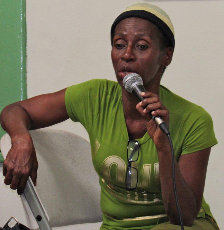 A representative of the Denham Town Community Development Centre and Justice of the Peace speaks at a Human Rights Forum in September, 2016 on the inadequate response of the police to gender-based violence. Photo by the author, used with permission.