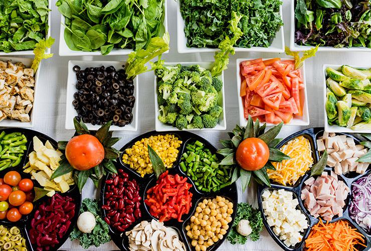 5 Tips to Stop Sabotaging Your Productivity and Health with Poor Food Choices by Sophia Smith. Photograph of a healthy food buffet by Dan Gold