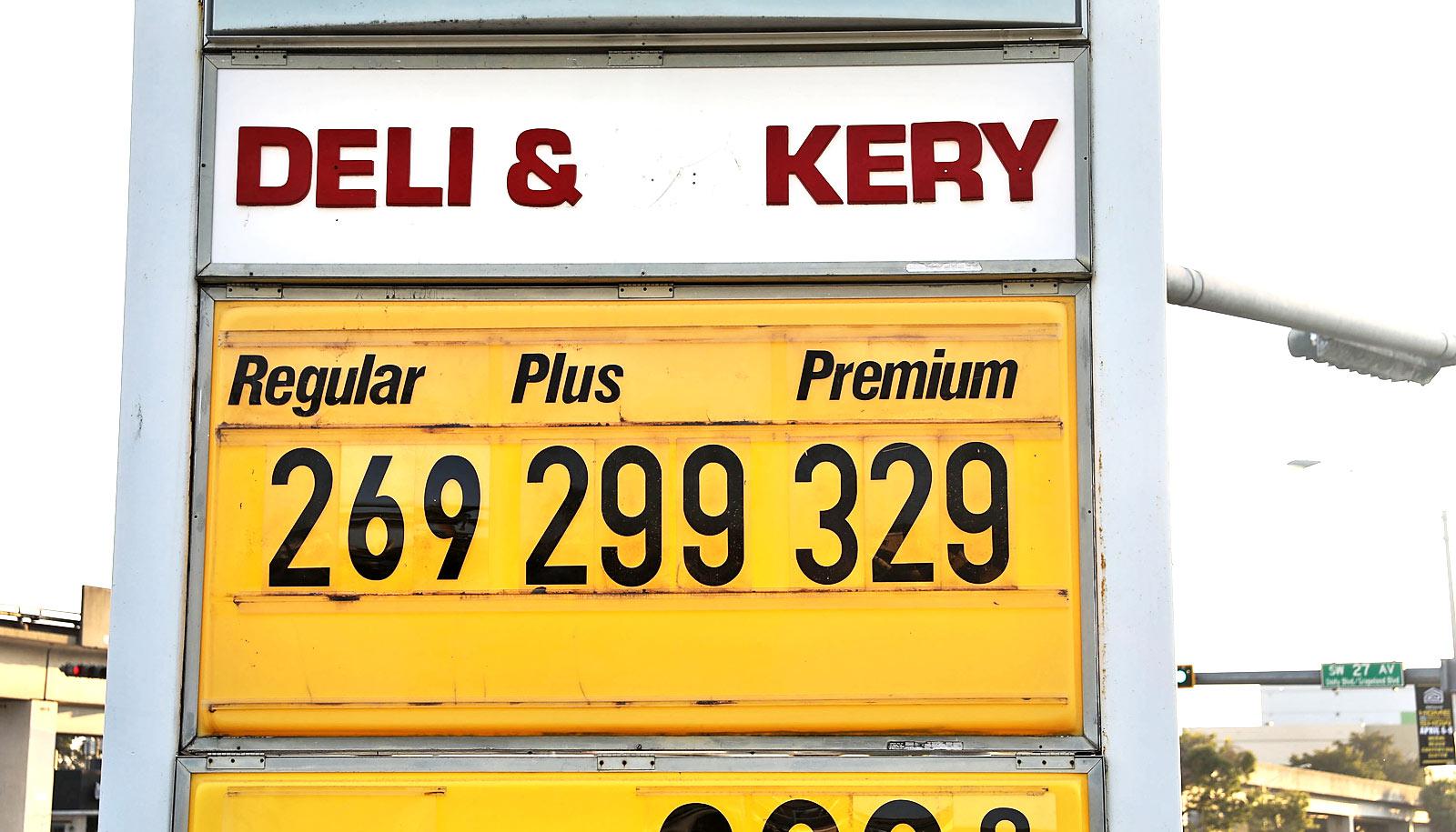 gas prices on yellow sign