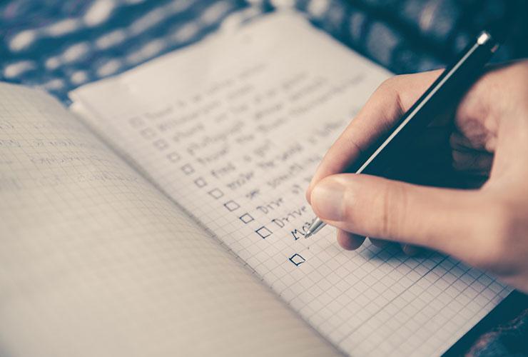 The Spirituality of Jealousy: Can It Help You Achieve Your Best Life? by Danyelle Simone. Photograph of hand writing in journal by Glenn Carstens-Peters