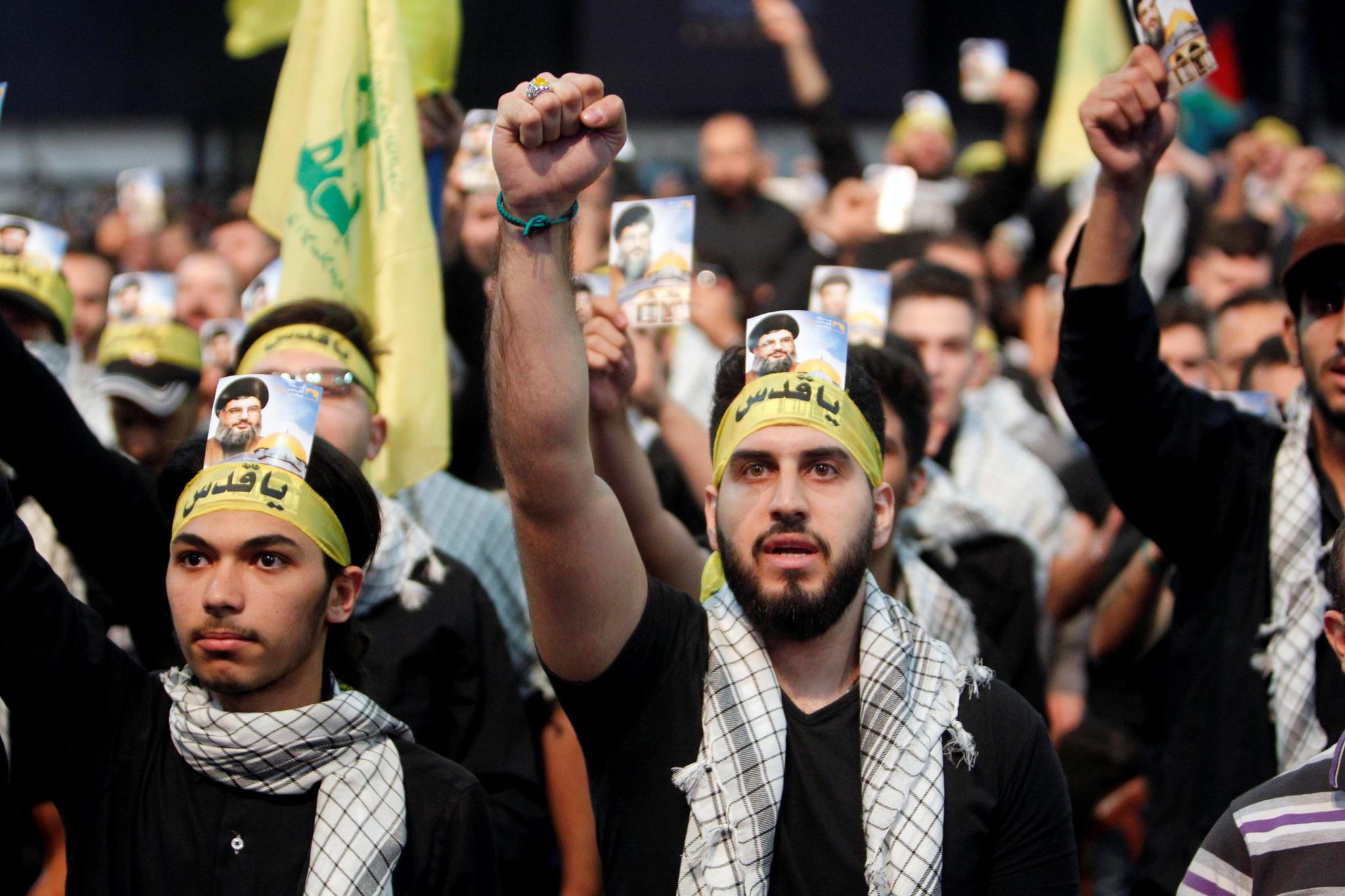 Supporters of Lebanon's Hezbollah leader Sayyed Hassan Nasrallah chant slogans and gesture during a rally marking Al-Quds day in Beirut's southern suburbs in Lebanon on June 23.