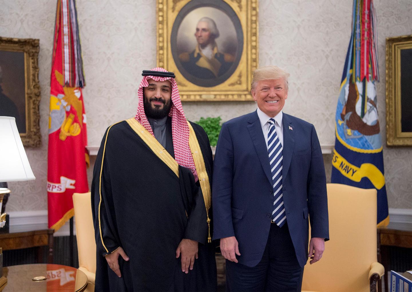 U.S. President Donald Trump poses for a photo with Crown Prince Mohammed bin Salman of Saudi Arabia in the Oval Office at the White House on March 20 in Washington, D.C.