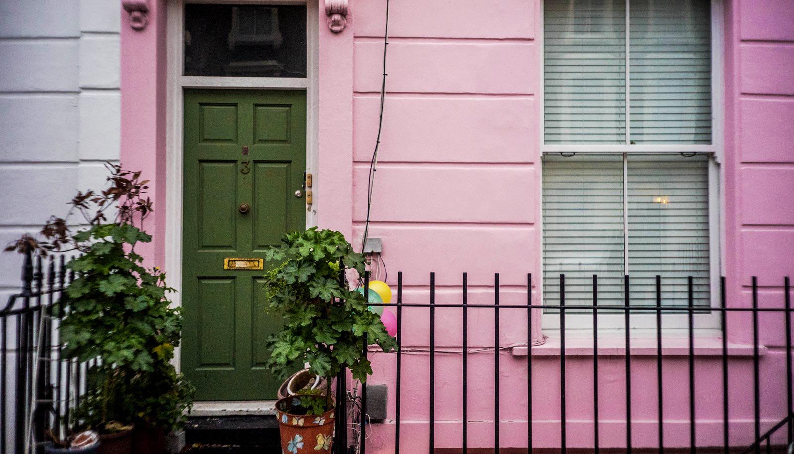 pink house with green door