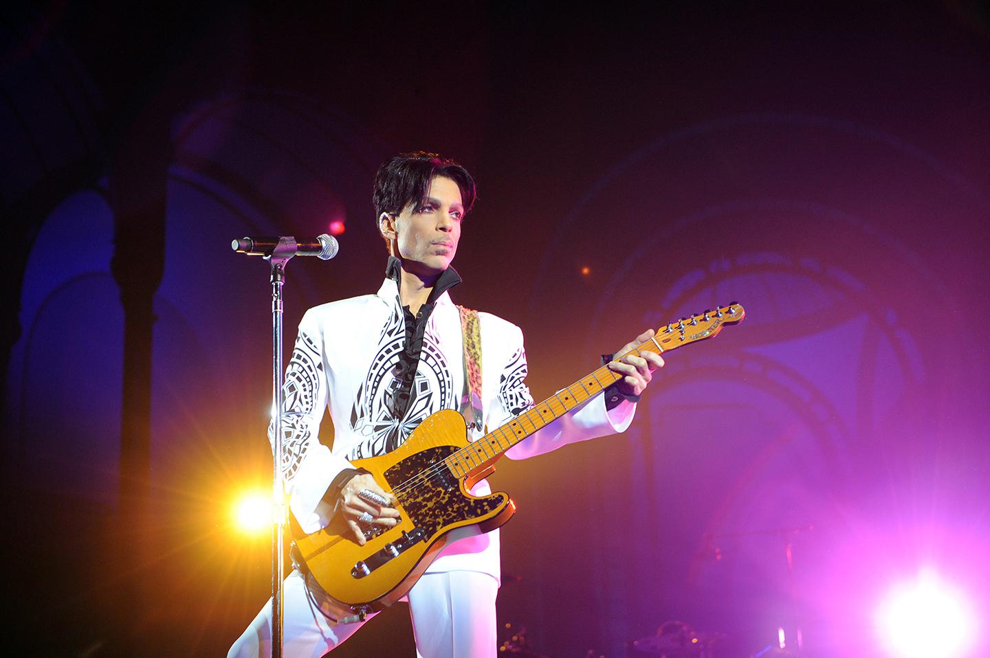 Prince performs on October 11, 2009 at the Grand Palais in Paris. The artist's posthumous album, 'Piano and a Microphone 1983,' is an unusually intimate glimpse of his creative process.